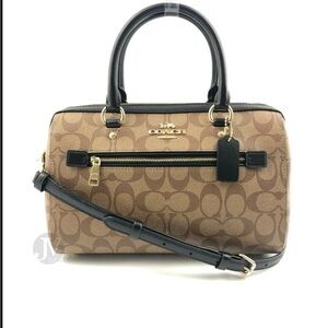 Coach purse BRAND NEW NEVER USED. Still in Coach Bag